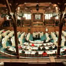 Members of the public watch proceedings on the first day of the Scottish Parliament in Edinburgh.