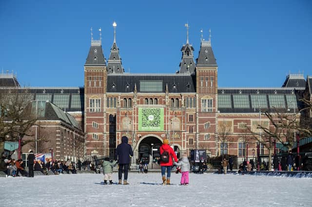 Family sightseeing in Amsterdam. Pic: Alamy/PA.