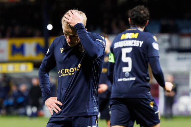 DUNDEE, SCOTLAND - DECEMBER 26: Dundee's Luke McCowan looks dejected as his side concede during a cinch Premiership match between Dundee and Celtic at the Scot Foam Stadium at Dens Park, on December 26, 2023, in Dundee, Scotland. (Photo by Ross Parker / SNS Group)