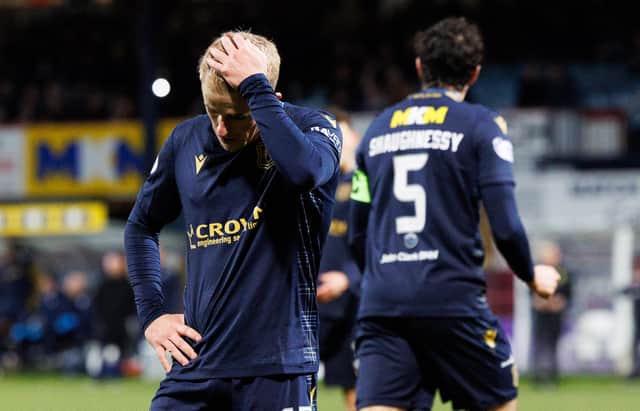 DUNDEE, SCOTLAND - DECEMBER 26: Dundee's Luke McCowan looks dejected as his side concede during a cinch Premiership match between Dundee and Celtic at the Scot Foam Stadium at Dens Park, on December 26, 2023, in Dundee, Scotland. (Photo by Ross Parker / SNS Group)