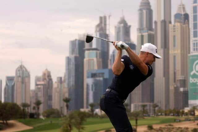 Calum Hill tees off at the iconic eighth hole at Emirates Golf Club during the Hero Dubai Desert Classic. Picture: Karim Sahib/AFP via Getty Images.