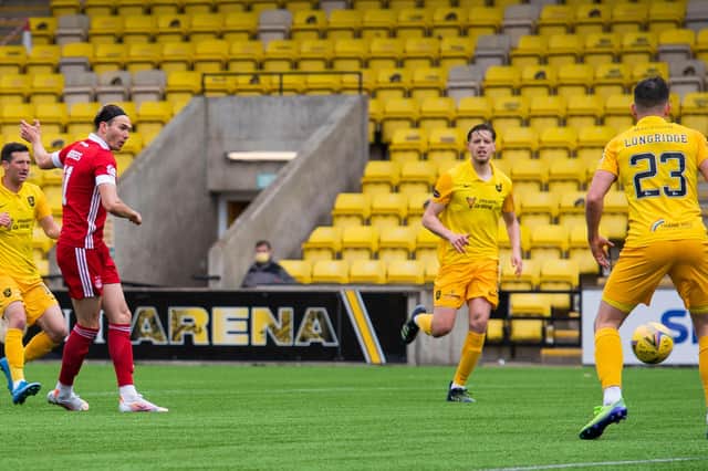 Aberdeen's Ryan Hedges turns in his ninth goal of an injury-disrupted season in Saturday's 2-1 win over Livingston (Photo by Paul Devlin / SNS Group)