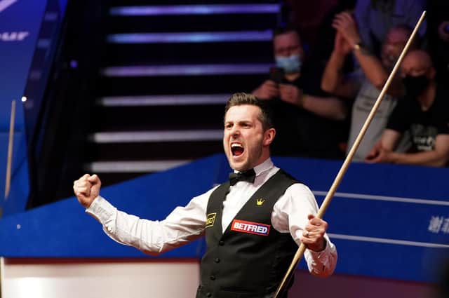Mark Selby celebrates his victory over Shaun Murphy.