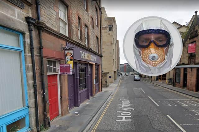 Police at the scene were dressed in head to toe suits with goggles and breathing masks, similar to the officer in the picture.