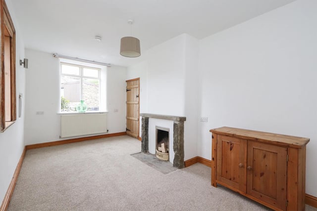 A lovely, bright space with a fireplace and lots of light.