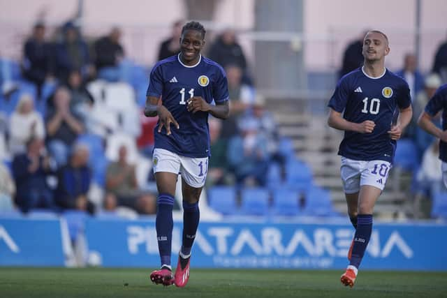 Dire Mebude celebrates after scoring Scotland Under-21's opener against Sweden. (Photo by Francisco Maciá/PhotoPlayers.com)