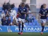 Dire Mebude celebrates after scoring Scotland Under-21's opener against Sweden. (Photo by Francisco Maciá/PhotoPlayers.com)