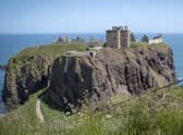Dunnottar Castle sits on a dramatic rocky headland near Stonehaven (Picture: Jane Barlow/PA)