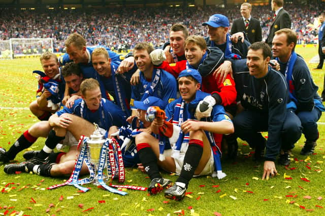 Rangers celebrate their 2002 Scottish Cup final success that brought Alex McLeish his first win in the competition as Ibrox manager and provided him with one of his "favourite" football memories. (Photo by SNS).
