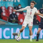 Stephen O'Donnell closely marked Jack Grealish. (Photo by CARL RECINE/POOL/AFP via Getty Images)