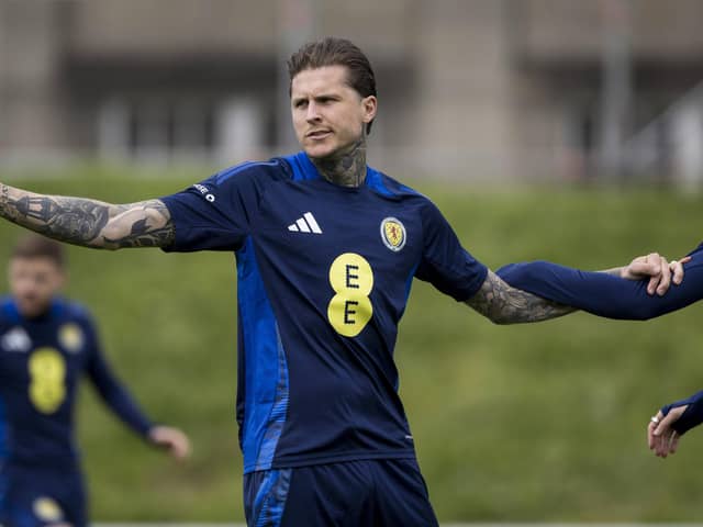 Lyndon Dykes was stretchered off during a Scotland training session at Lesser Hampden.