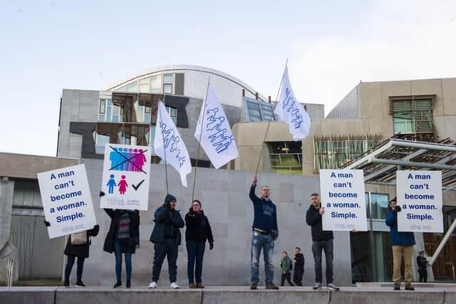 Those campaigning against the gender reforms outside the Scottish Parliament. Image: Lisa Ferguson/National World.