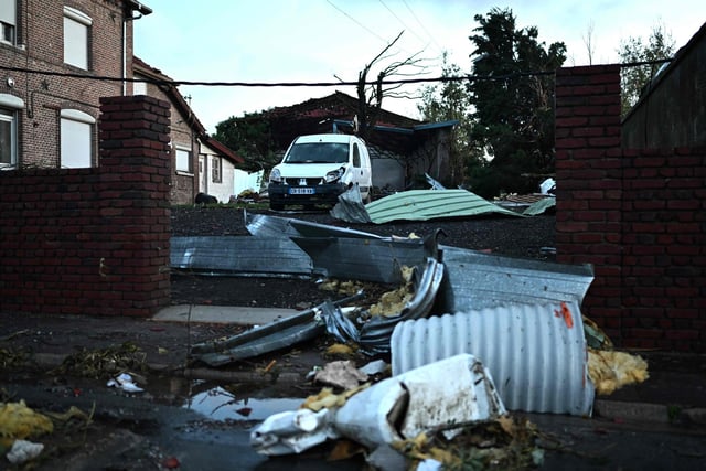 This photograph taken in Bihucourt, northern France on October 24, 2022 shows damages after a tornado hit the region. Strong winds also buffeted Belgium and the Netherlands but no major damage was reported.

 (Photo by SAMEER AL-DOUMY/AFP via Getty Images)