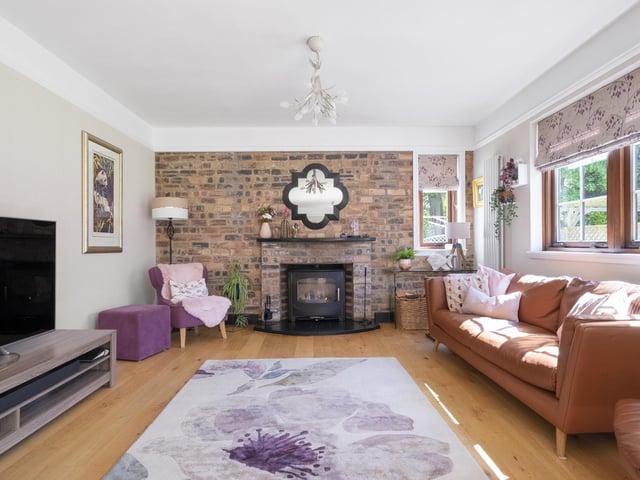 Exterior: An impressive gated driveway leads up to the property, which has an enclosed lawned rear garden with patio, summerhouse, and abundant plants, trees and shrubs.
Contact: Rollos