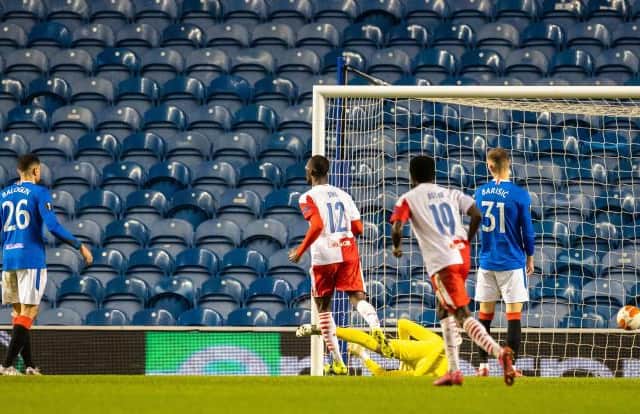 Allan McGregor is beaten by Peter Olayinka's 14th minute header for the opening goal in Slavia Prague's 2-0 win over Rangers at Ibrox. (Photo by Alan Harvey / SNS Group)
