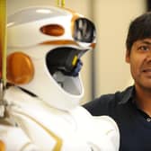 Professor Sethu Vijayakumar, an Edinburgh University roboticist and fellow of the Royal Society of Edinburgh, with Nasa humanoid Valkyrie