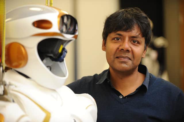 Professor Sethu Vijayakumar, an Edinburgh University roboticist and fellow of the Royal Society of Edinburgh, with Nasa humanoid Valkyrie