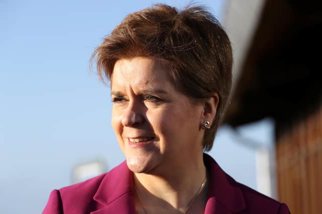 First Minister Nicola Sturgeon looks on at the Whitelee Wind Farm ahead of the SNP's annual conference. Picture: Russell Cheyne - Pool / Getty Images