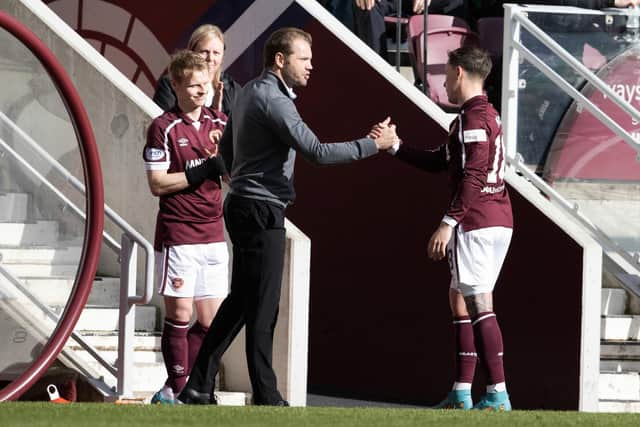 Hearts manager Robbie Neilson and Barrie McKay.