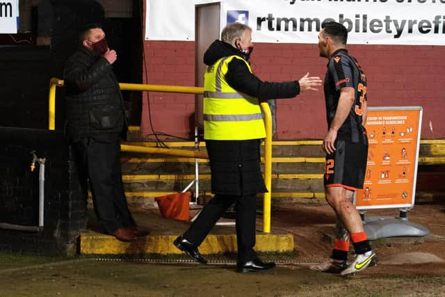 Dundee United's Tony Watt and Motherwell chief executive Alan Burrows during a cinch Premiership match between Dundee United and Motherwell. (Photo by Mark Scates / SNS Group)