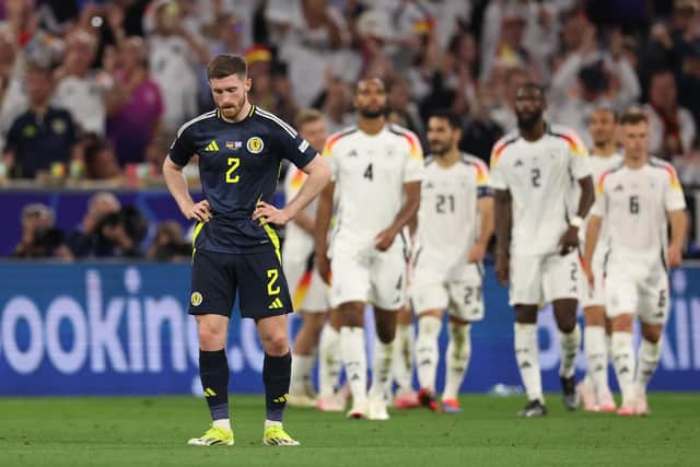 Scotland's Anthony Ralston looks dejected after Niclas Fuellkrug scors Germany's fourth in the Euro 2024 opener in Munich. (Photo by Alexander Hassenstein/Getty Images)