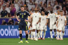 Scotland's Anthony Ralston looks dejected after Niclas Fuellkrug scors Germany's fourth in the Euro 2024 opener in Munich. (Photo by Alexander Hassenstein/Getty Images)
