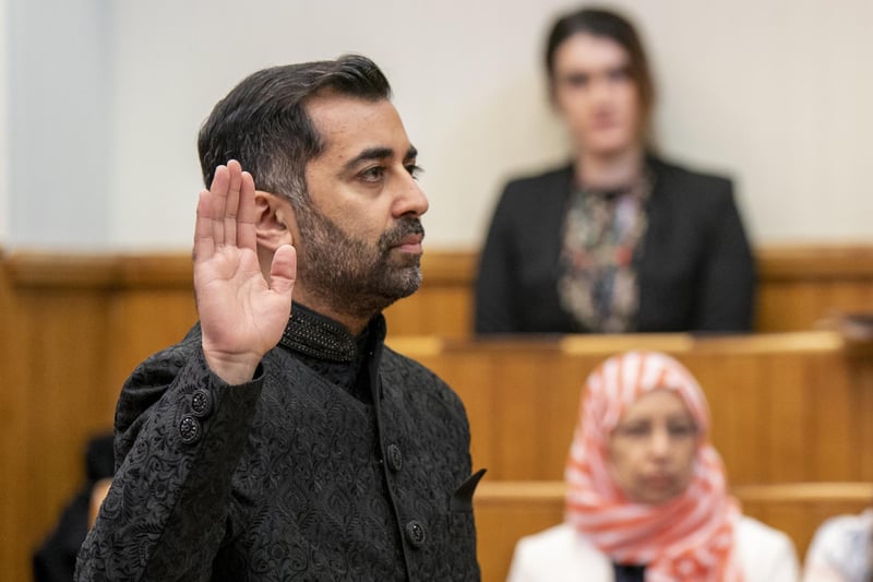 Humza Yousaf takes the oath as he is sworn in as First Minister of Scotland at the Court of Session, Edinburgh. Picture date: Wednesday March 29, 2023.