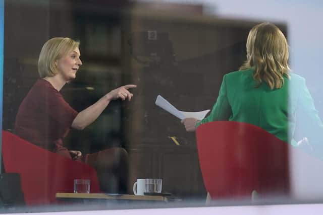 Prime Minister Liz Truss (left) in the BBC studio in Birmingham to appear on the BBC1 current affairs programme, Sunday with Laura Kuenssberg, as the Conservative Party annual conference gets underway
