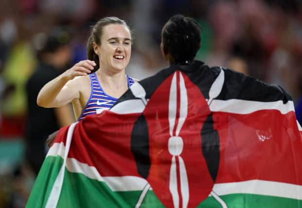 Laura Muir with Women's 1500m winner Faith Kipyegon. (Photo by Steph Chambers/Getty Images)