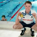Duncan Scott with his Olympics medals at the Peak Leisure Centre, Stirling, where he was giving expert swimming tips to Learn to Swim classes. Picture: Jane Barlow/PA Images