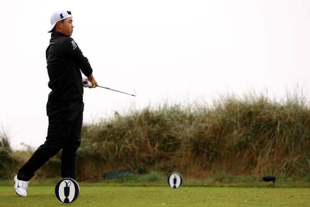 Korean Tom Kim tees off on the 13th hole in the final round of the 151st Open. Picture: Gregory Shamus/Getty Images.