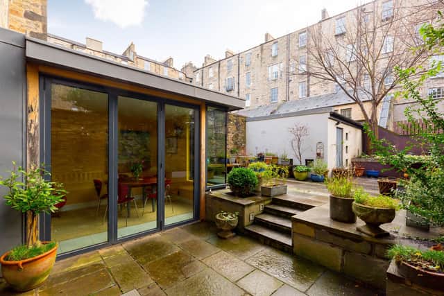 The private courtyard is a "suntrap" on brighter days. Image: Angus Behm