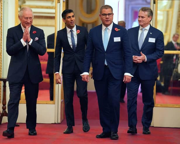 King Charles III (far left) arrives with, (left to tight) Prime Minister Rishi Sunak, Alok Sharma (centre) who presided over COP26 and Brian Moynihan, chair and CEO of Bank of America and Co-Chair of the Sustainable Markets Initiative. Picture: Jonathan Brady/PA Wire