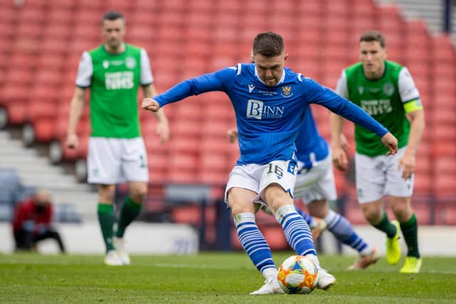 St Johnstone's Glenn Middleton sees his penalty saved by Matt Macey.