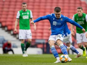 St Johnstone's Glenn Middleton sees his penalty saved by Matt Macey.