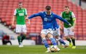 St Johnstone's Glenn Middleton sees his penalty saved by Matt Macey.