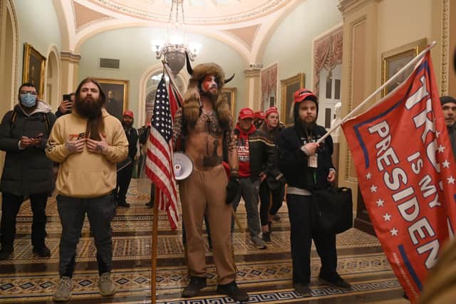 The mob which stormed the Capitol included members of the QAnon conspiracy group and other extremists. (Picture: Saul Loeb/AFP via Getty Images)