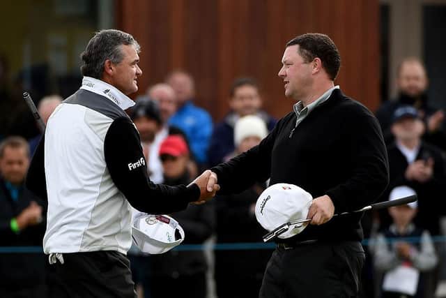 Chris Doak, right, is congratulated by Paul Lawrie after winning their match in the Saltire Energy Paul Lawrie Matchplay at Murcar Links in 2015. Picture: Ross Kinnaird/Getty Images.