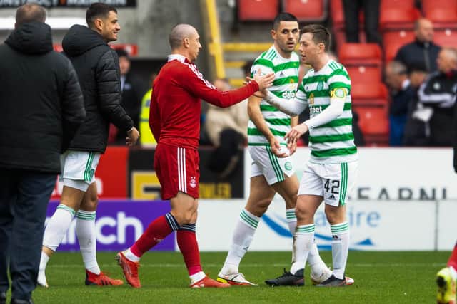 Celtic's Callum McGregor acknowledges  his former team-mate and now Aberdeen captain Scott Brown after the clubs' first meeting of the season, at Pittodrie eiight weeks ago. (Photo by Ross MacDonald / SNS Group)