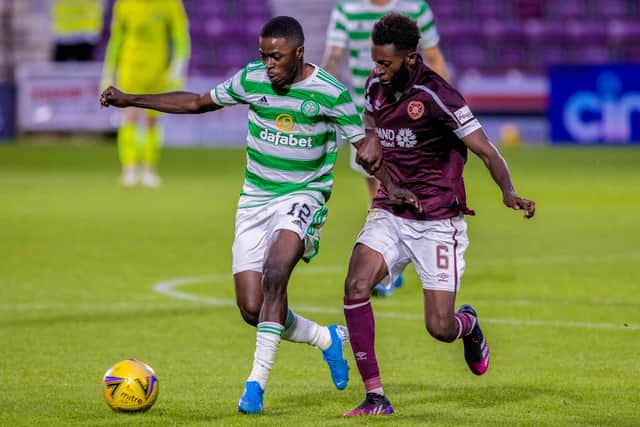 Beni Baningime battles for the ball with Celtic's Ismaila Soro during his Hearts debut. (Photo by Craig Williamson / SNS Group)