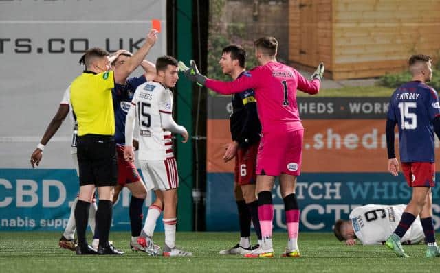Kilmarnock goalkeeper Zach Hemming (centre) is sent off by referee John Beaton for a tackle on Hamilton's Andy Ryan during a Cinch Championship match between Hamilton and Kilmarnock at the Fountain of Youth Stadium, on December 26, 2021, in Hamilton, Scotland (Photo by Sammy Turner / SNS Group)