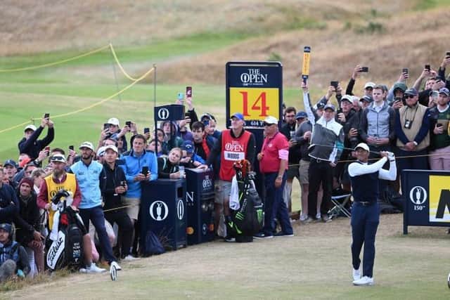 Tiger Woods on the 14th tee during his first round at The 150th Open at St Andrews Old Course. (Photo by Ross Parker / SNS Group)