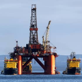 The oil platform Stena Spey is moved with tugboats amongst other rigs. PIC: Andrew Milligan/PA Wire