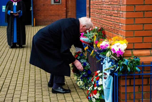 John Greig lays a wreath at the Ibrox Disaster memorial outside the stadium. (Photo by Ross MacDonald / SNS Group)
