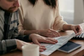 A couple reviewing paperwork.