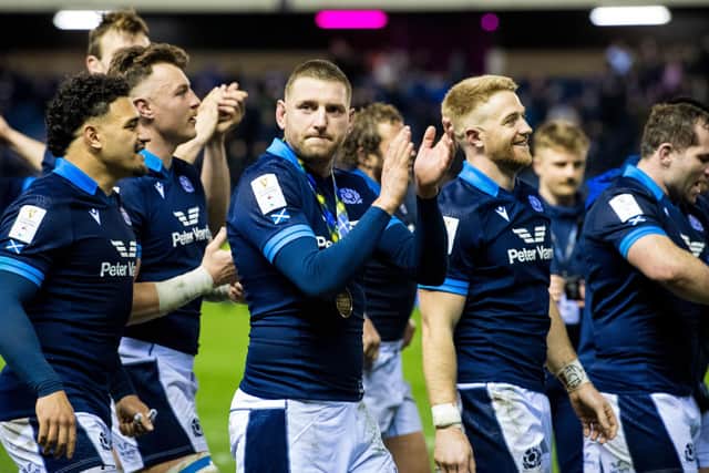 Finn Russell (centre) after Scotland's win over Wales at Murrayfield last month. (Photo by Ross Parker / SNS Group)