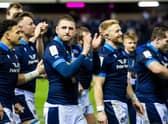 Finn Russell (centre) after Scotland's win over Wales at Murrayfield last month. (Photo by Ross Parker / SNS Group)
