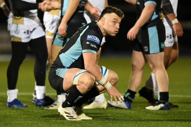 Jack Dempsey takes a well earned breather at full-time after the 33-14 win over Dragons. (Photo by Ross MacDonald / SNS Group)