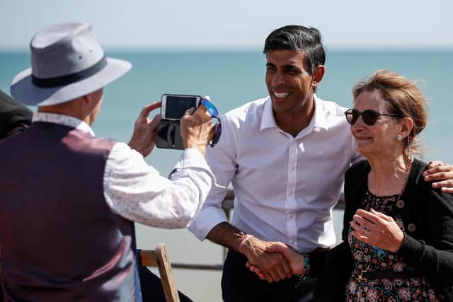 Rishi Sunak has his picture taken during a members event in Bexhill, Sussex, ahead of the hustings in Eastbourne on Friday