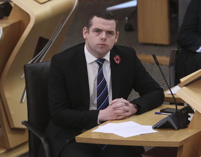 Douglas Ross MSP Scottish Conservative Leader during First Minster's Questions at the Scottish Parliament in Holyrood, Edinburgh. Picture date: Thursday November 11, 2021.